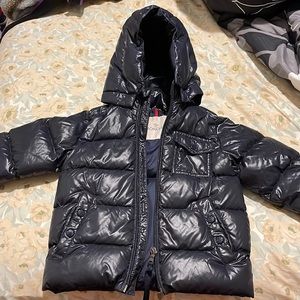 Moncler quilted jacket ( Finland) hood trim.